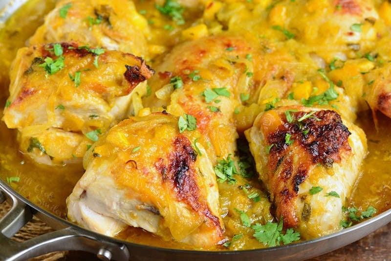 mango baked chicken in a pan