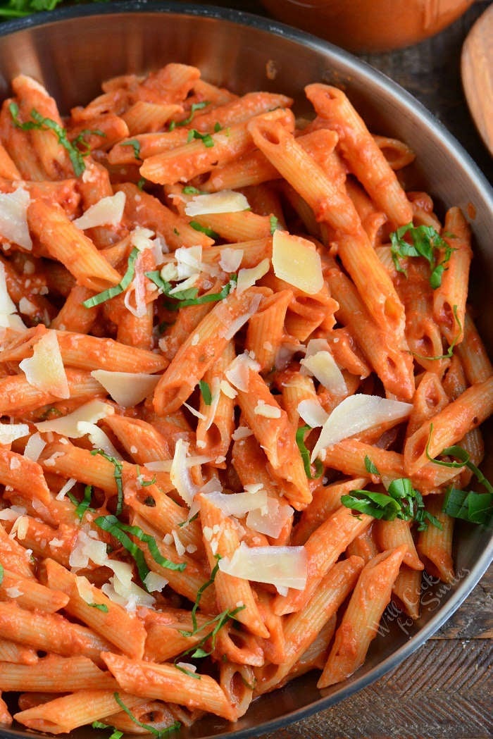 Vodka Sauce mixed with pasta in a metal bowl 