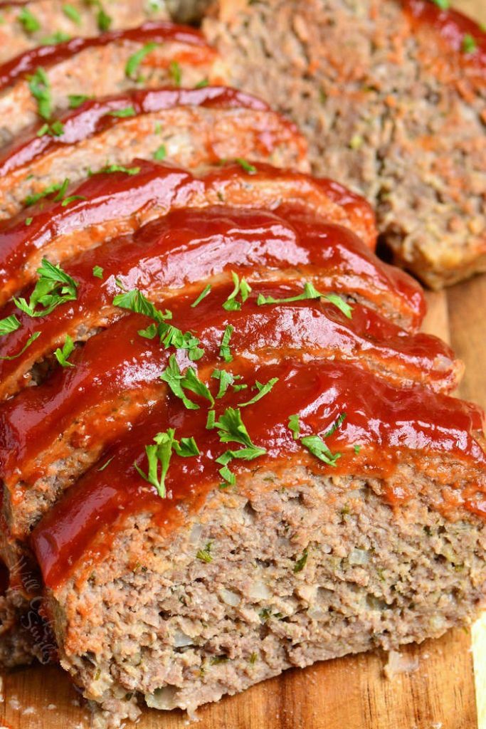 front view of sliced meatloaf on cutting board.