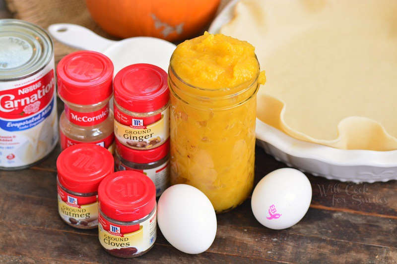 ingredients for pumpkin pie laid out on the board.