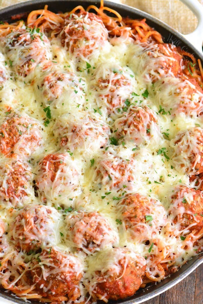 spaghetti and meatballs in a pan 