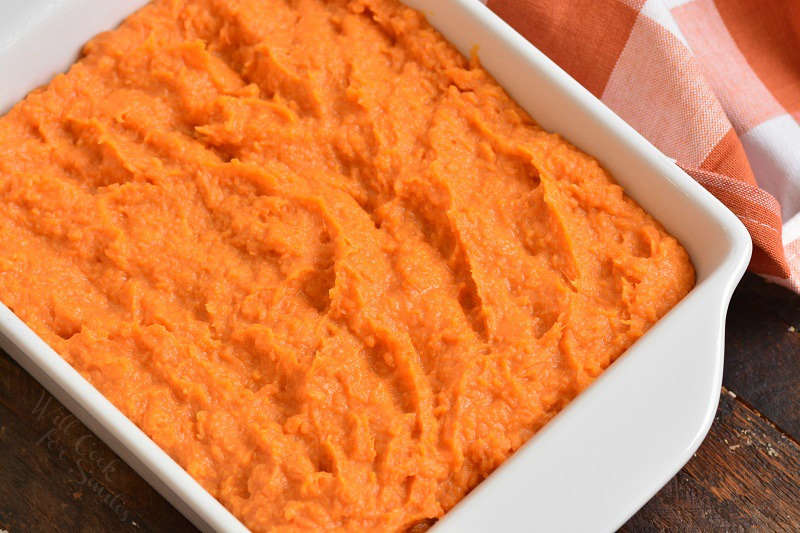 sweet potato mixture spread in baking dish.