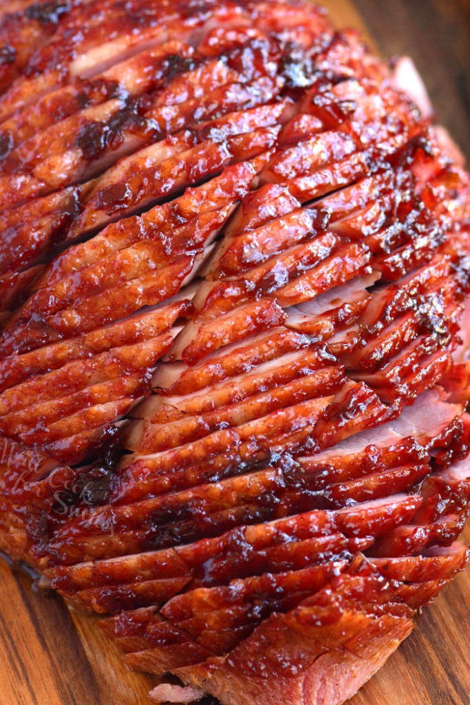 top view of baked ham with cherry ham glaze.
