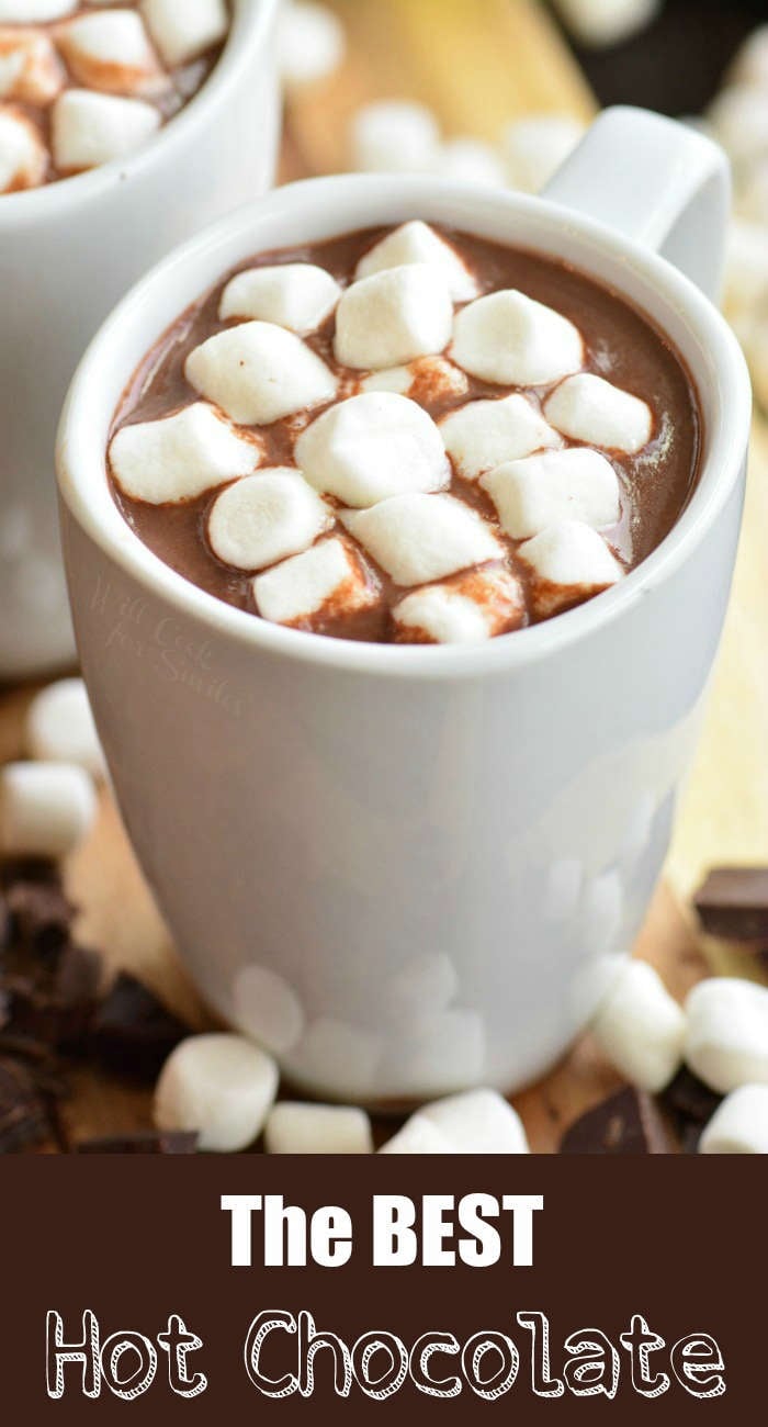 hot chocolate in a mug with marshmallows on top 