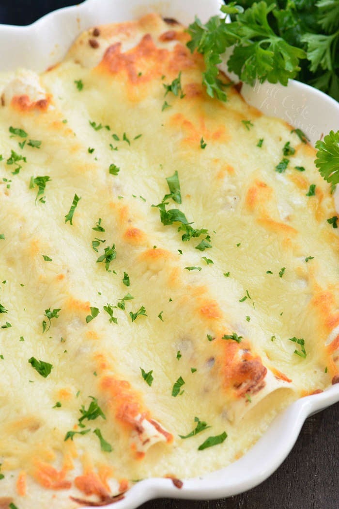 baked four creamy turkey enchiladas in the baking dish.