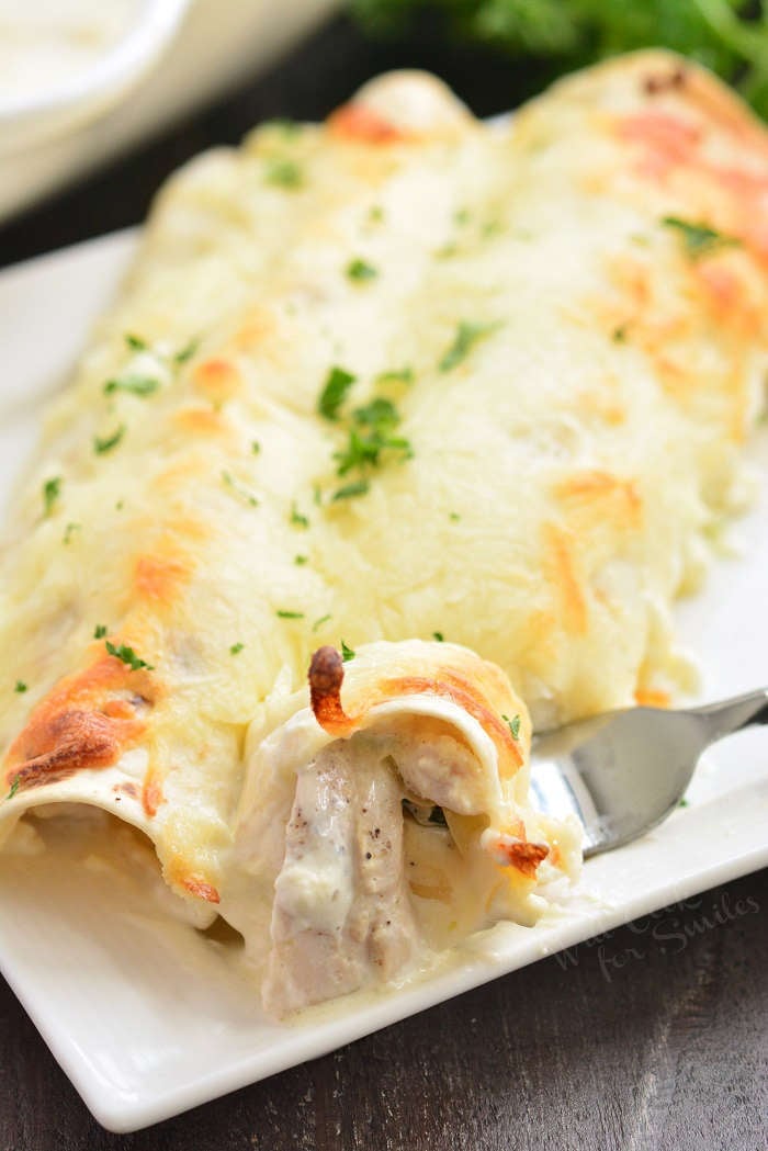 creamy turkey enchiladas on a plate