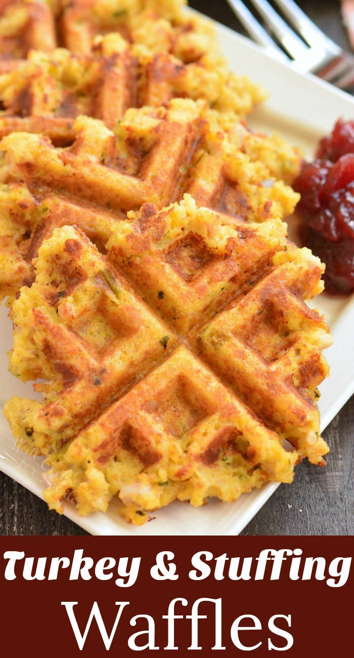 stuffing waffles on a plate with a side of cranberry sauce 