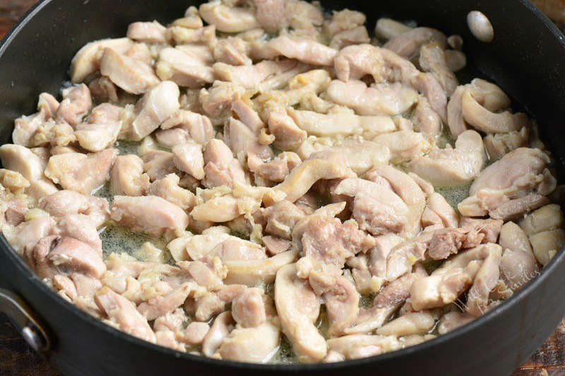 chicken cooking in the pan