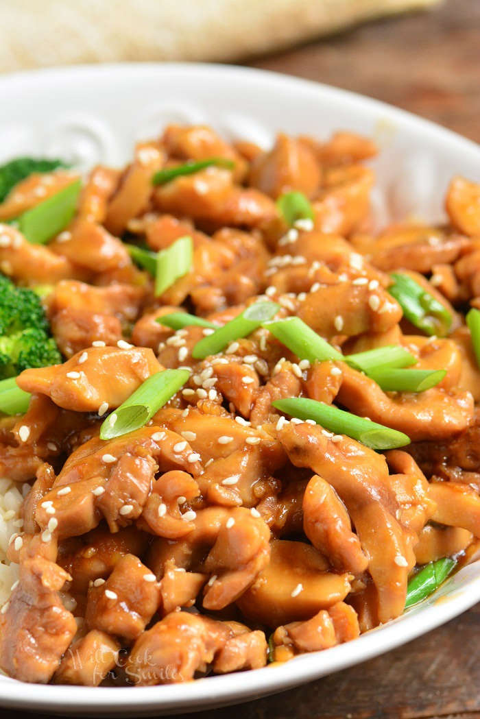 chicken in a bowl with green onions