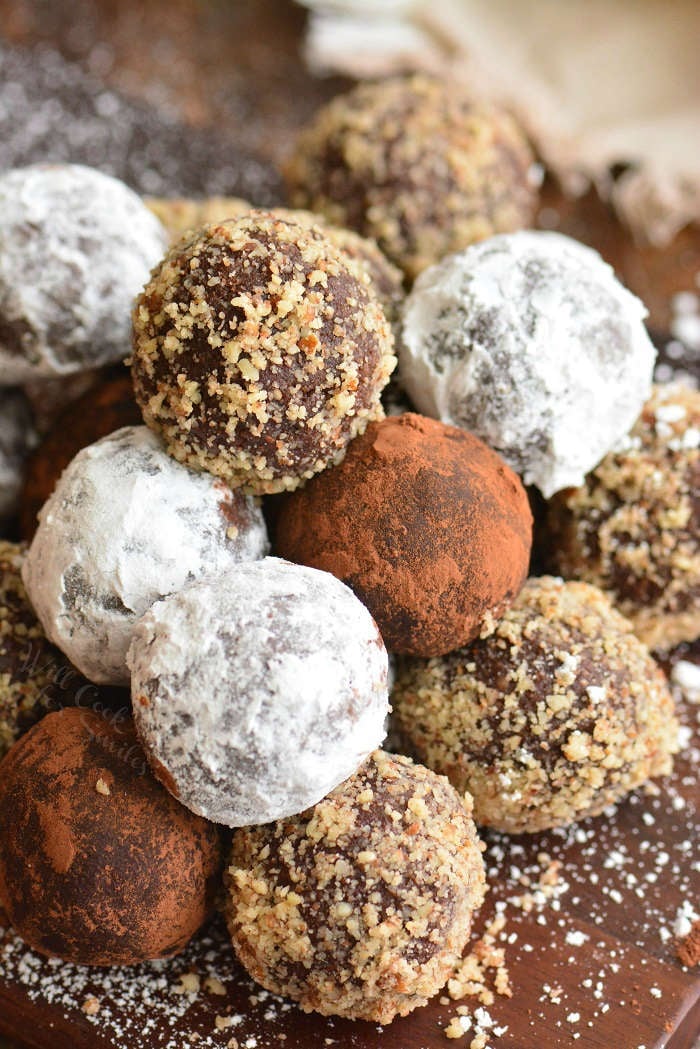 coated rum balls on a cutting board