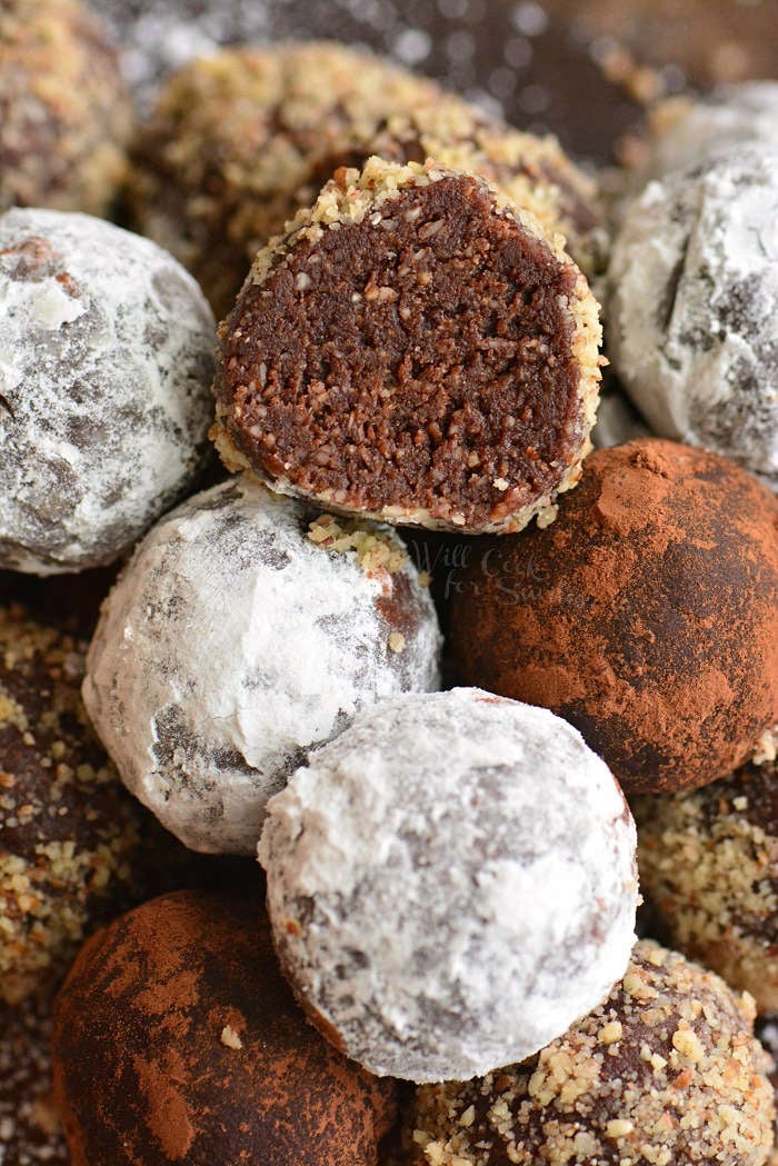 rum ball cut in half piled up on other rum balls 