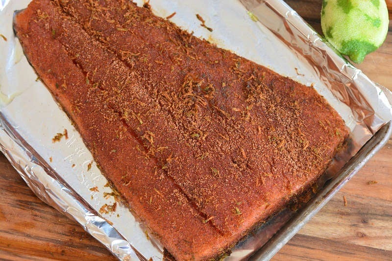 seasoned salmon on the baking sheet