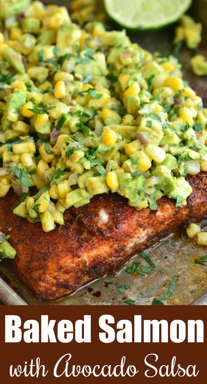 baked salmon with avocado salsa on a baking sheet 