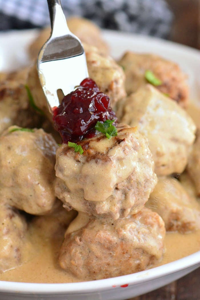 meatball with lingonberry jam on a fork