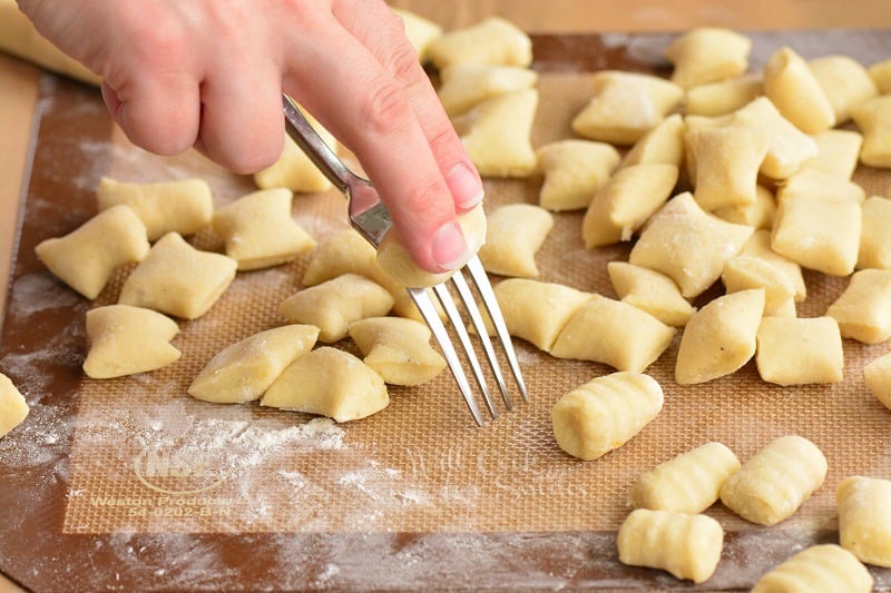 rolling gnocchi into shapes