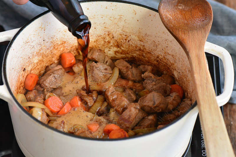 adding beer to the pot