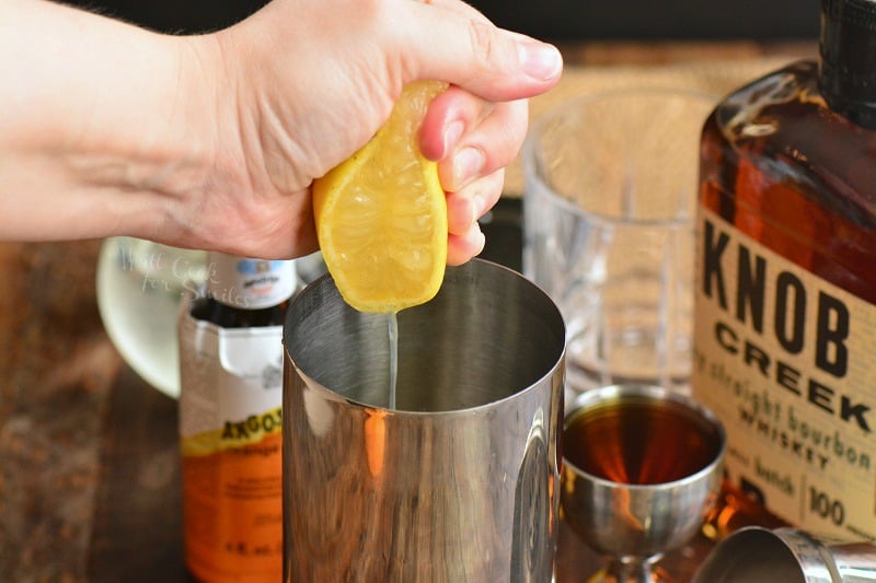 squeeze lemon into shaker