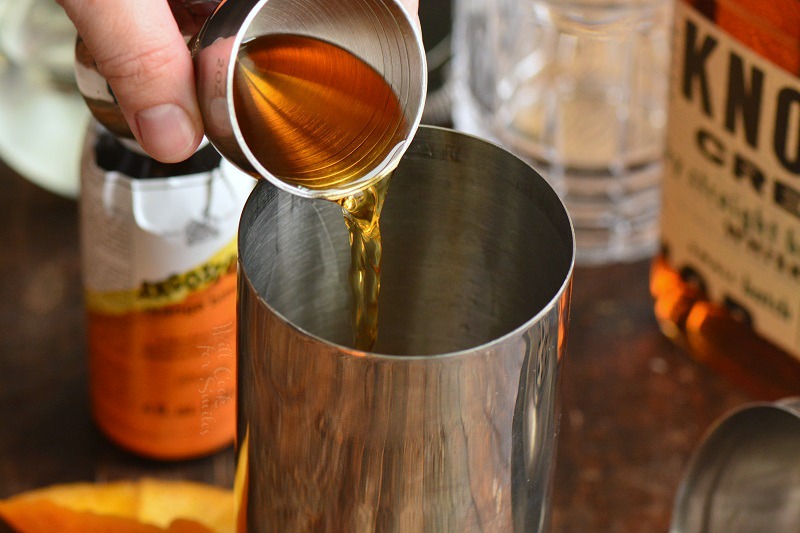 pour bourbon into shake