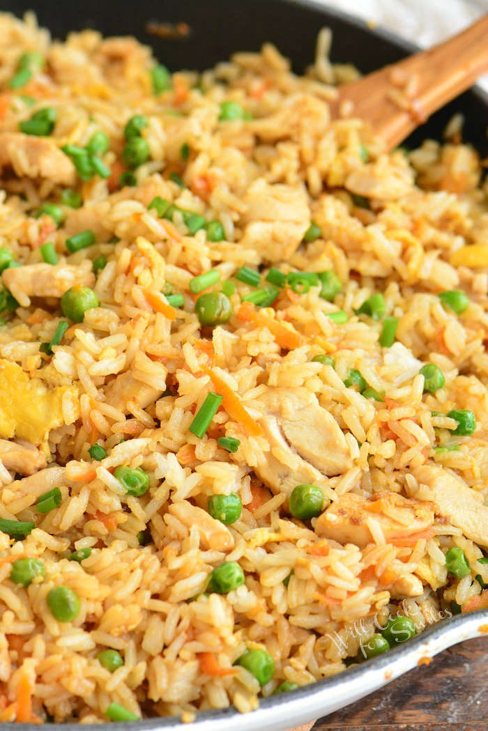 cooked chicken fried rice in a pan vertical view