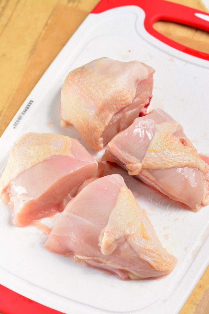 chicken breasts with bone in cut in half