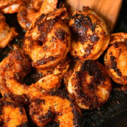 close up photo: tail-on shrimp with blackening spices