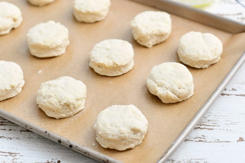 unbaked buttermilk biscuits on baking sheet