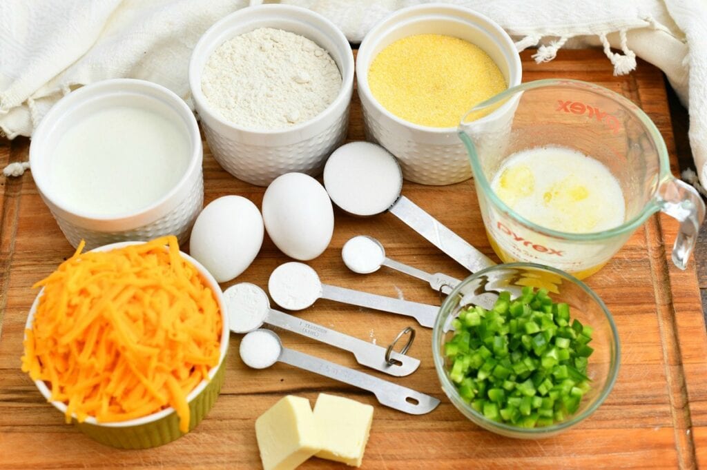 ingredients in small prep bowls to make a cheesy jalapeno cornbread recipe