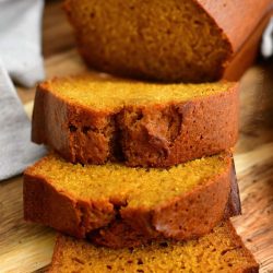 moist, thick slices of homemade pumpkin bread cut from the loaf