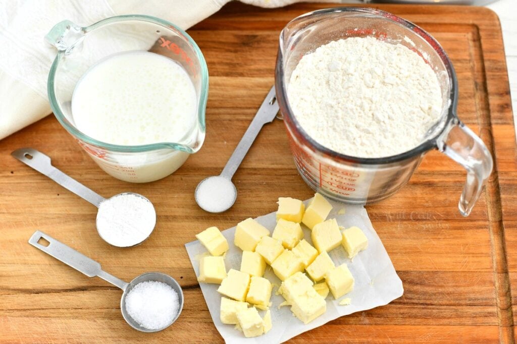 ingredients for biscuits on a wooden cutting board