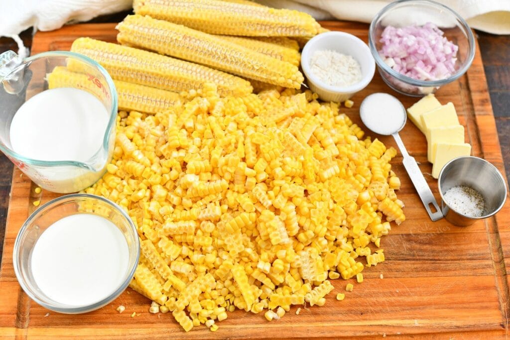 ingredients on a cutting board to make recipe for creamed corn