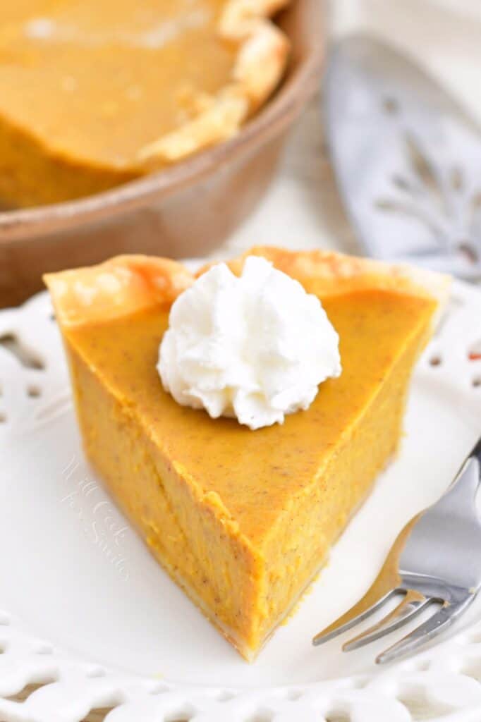 slice of pie on the white plate with a fork