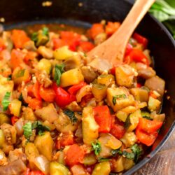 French vegetable stew simmering in cast iron pan