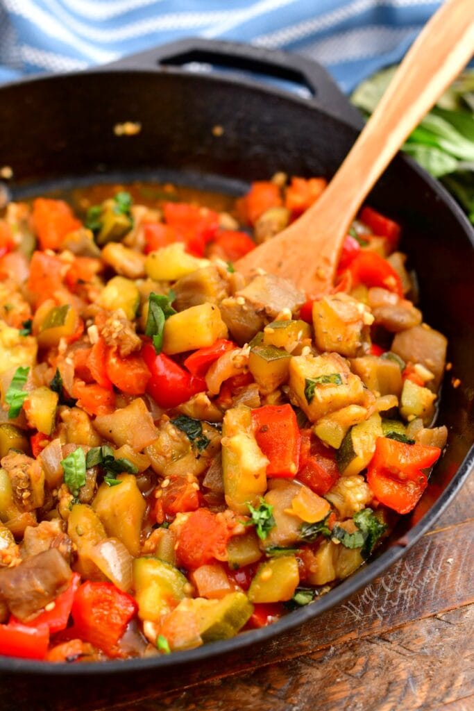 French vegetable stew simmering in cast iron pan