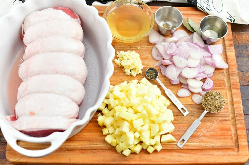 ingredients prepped on cutting board for roasting pork loin