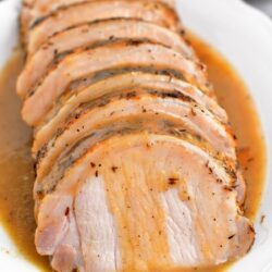 slices of juicy pork with brown gravy