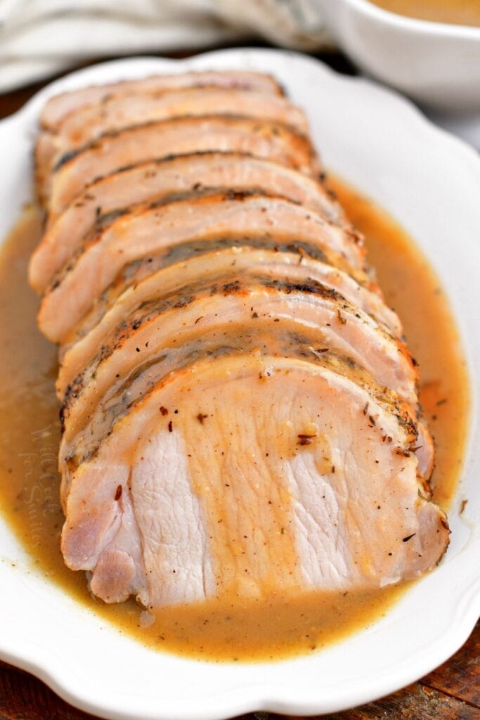 slices of juicy pork with brown gravy