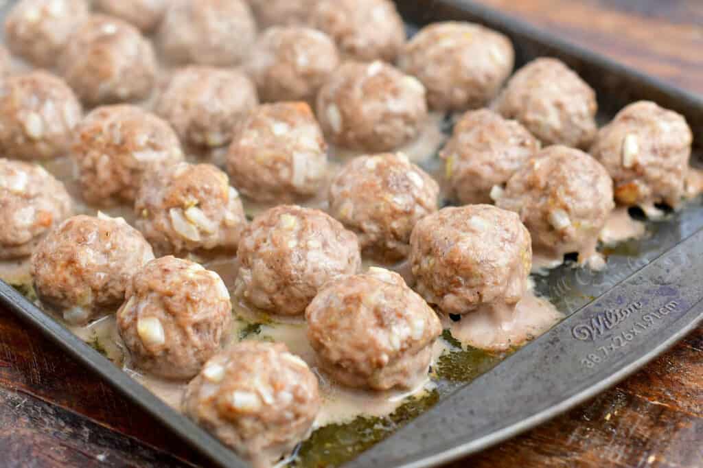 baked cocktail meatballs on baking sheet