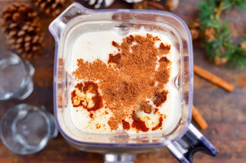 overhead image: ingredients in a blender to make a coquito recipe