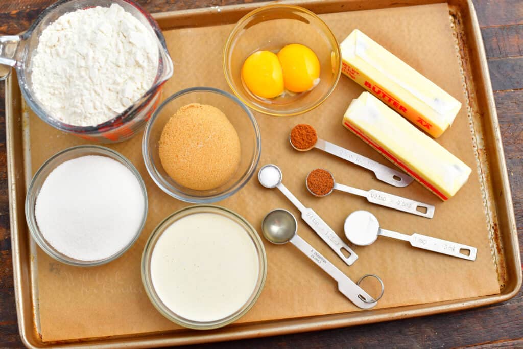 cookie recipe ingredients are placed on a baking sheet.