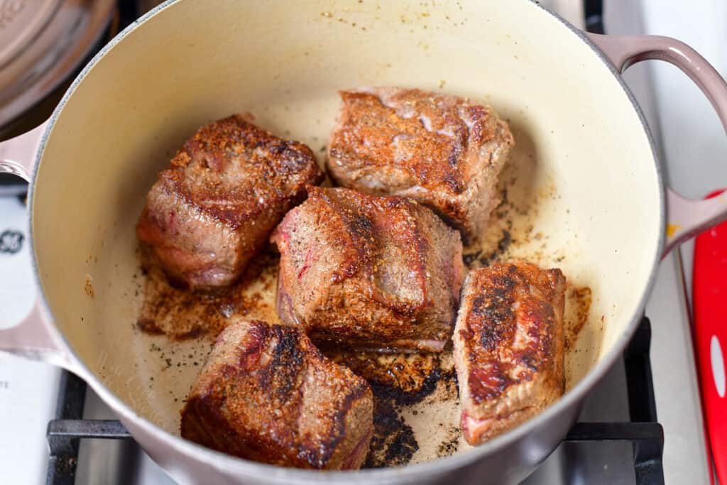 braised beef in large Dutch oven on stove top