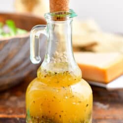 Italian vinaigrette dressing in glass bottle