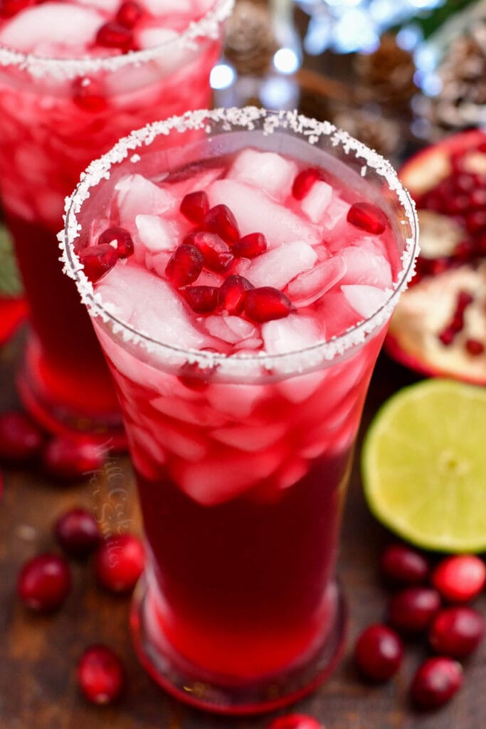 side top view of the margarita cocktail in a glass garnished with pomegranate seeds