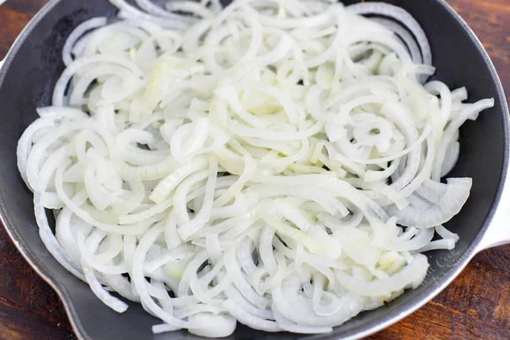 sliced onions in a large skillet