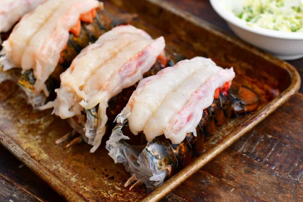 close up of lobster tails ready for baking in oven