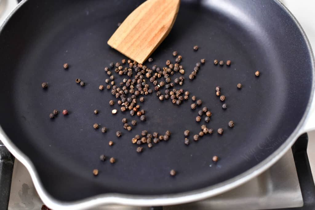 toasting whole peppercorns in a skillet