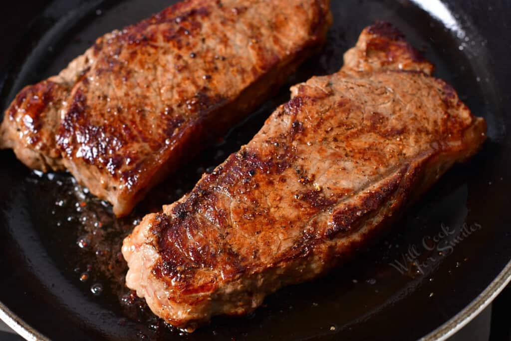 close up: pan seared steak in a skillet