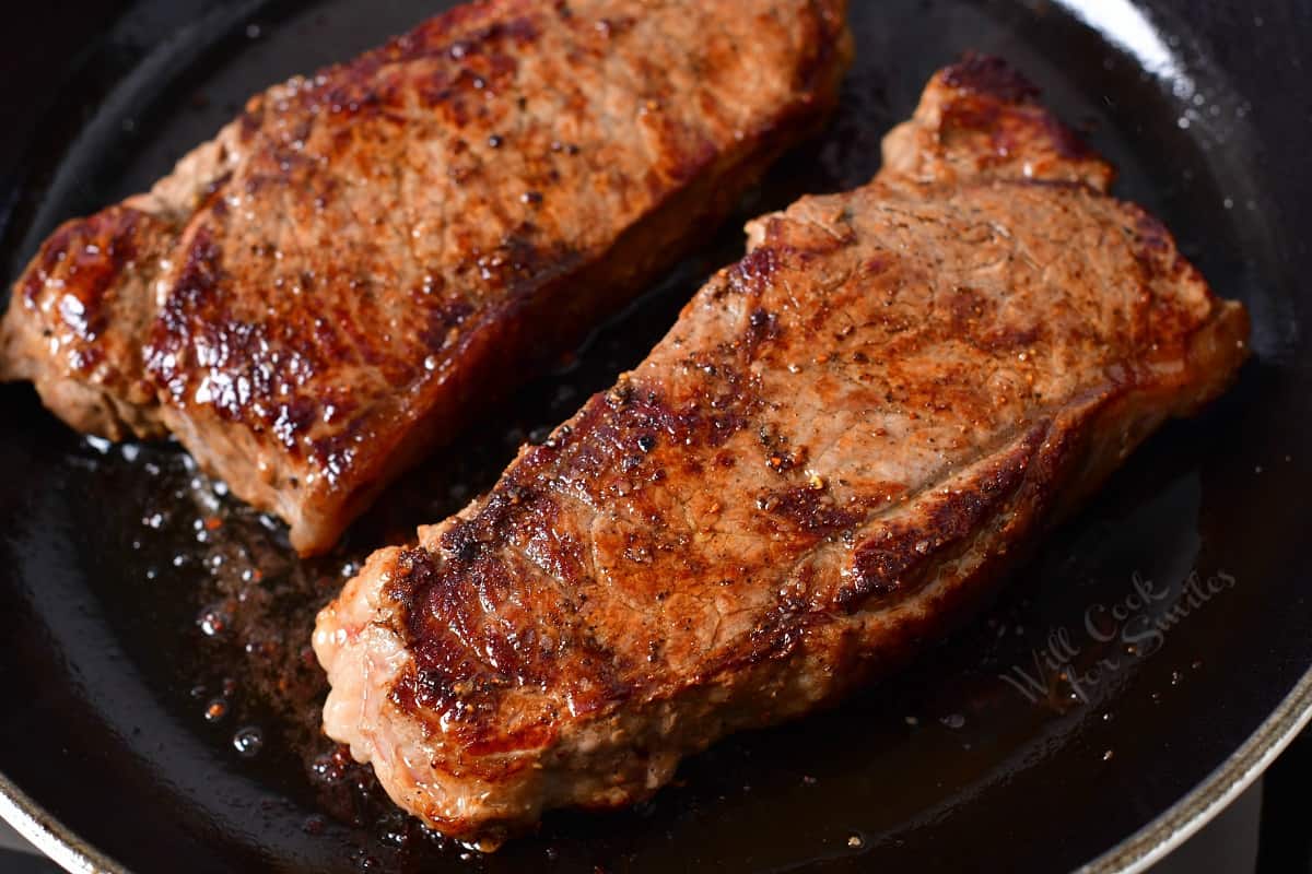 close up: pan seared steak in a skillet