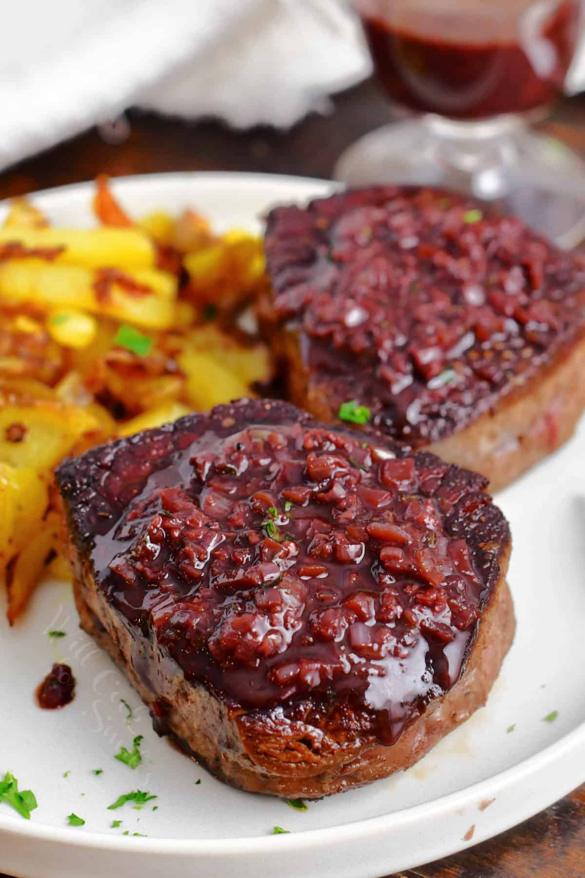 Steaks with red wine steak sauce on a plate