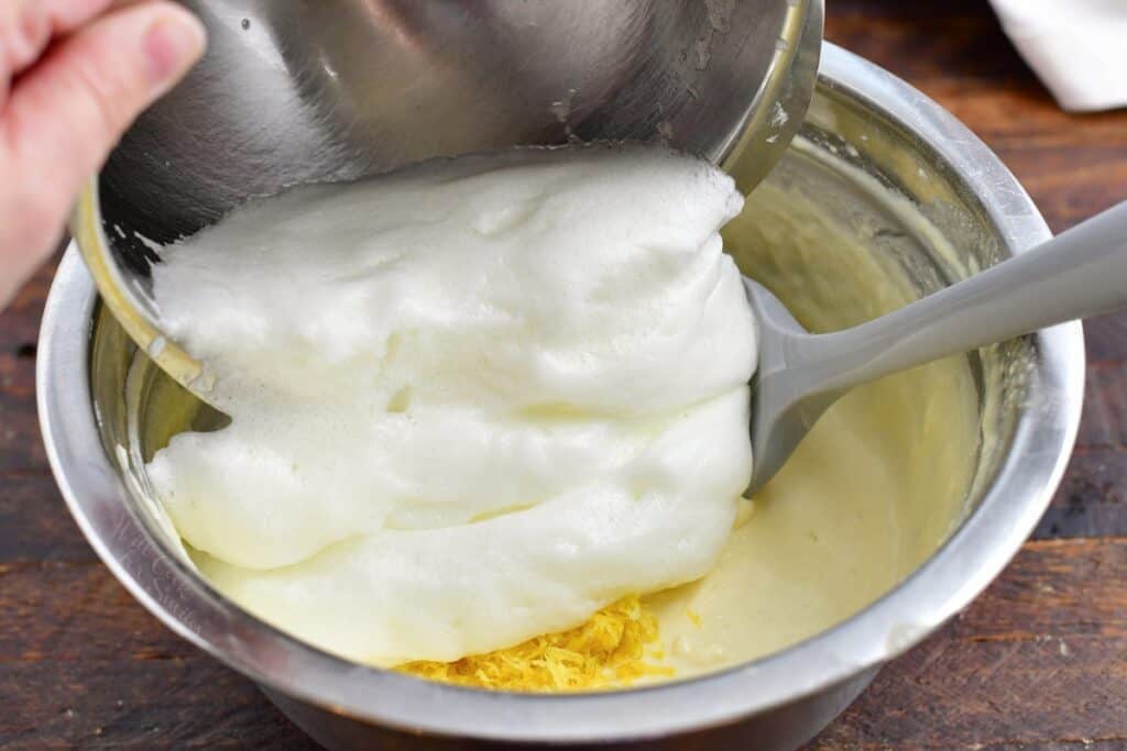 Egg whites are being folded into the pancake batter.