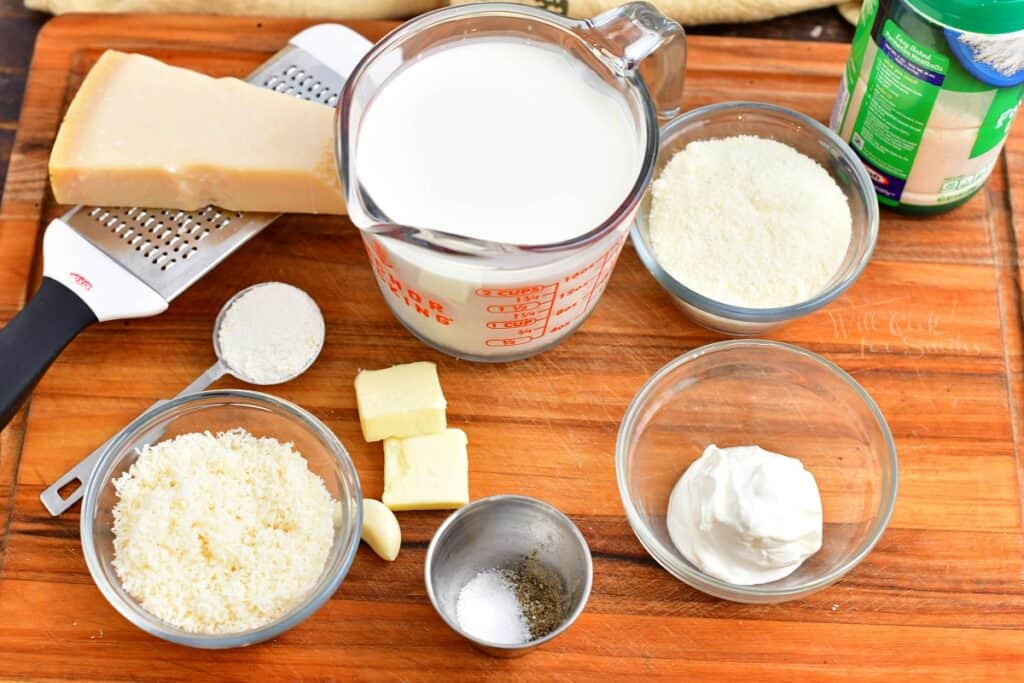 ingredients for Alfredo sauce on the cutting board. 